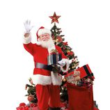 Papá Noel con los regalos junto al árbol de navidad